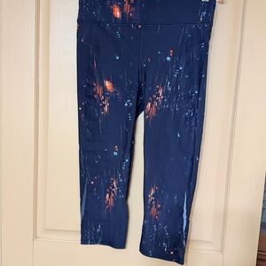 Sweaty Betty Navy Capri Leggings with Orange and Light Blue Accents